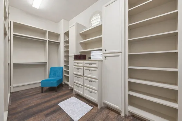 a view of a hallway with a chandelier
