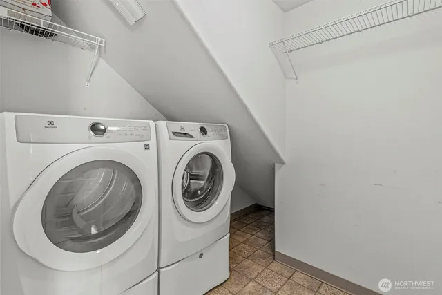 a utility room with dryer and washer