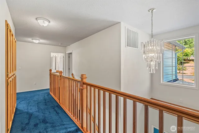 a room with a bed and window