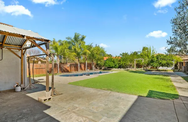 a view of a park with swings and slides