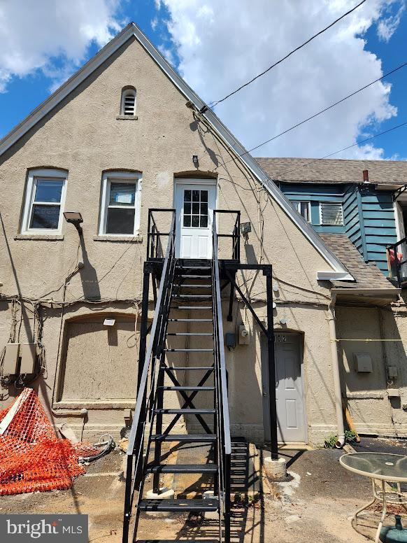 108 New Broadway, Unit 100B Brooklawn, NJ 08030 - Photo 12 of 14 a front view of a house with stairs
