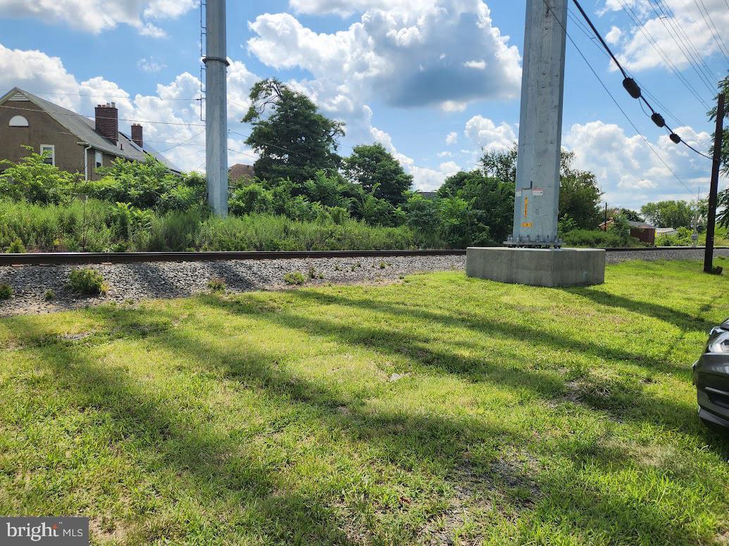 108 New Broadway, Unit 100B Brooklawn, NJ 08030 - Photo 14 of 14 a view of pool with a yard and a fountain