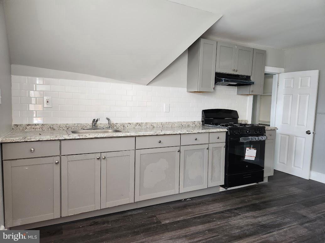 108 New Broadway, Unit 100B Brooklawn, NJ 08030 - Photo 5 of 14 a kitchen with granite countertop cabinets and steel stainless steel appliances