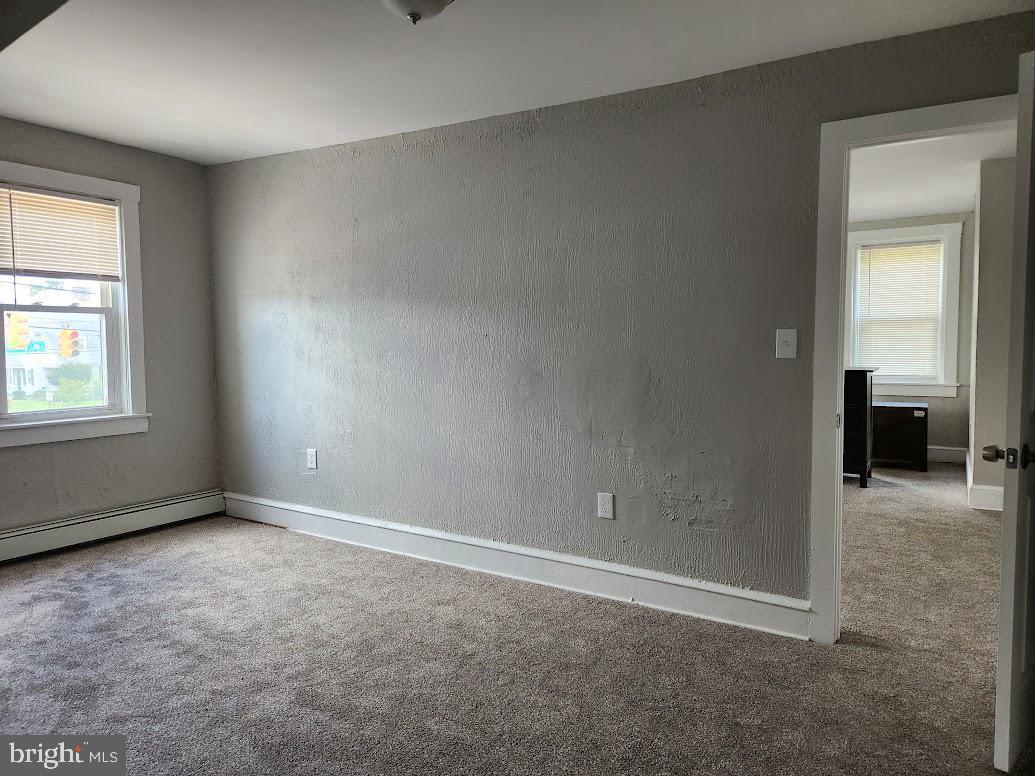 108 New Broadway, Unit 100B Brooklawn, NJ 08030 - Photo 10 of 14 an empty room with a window