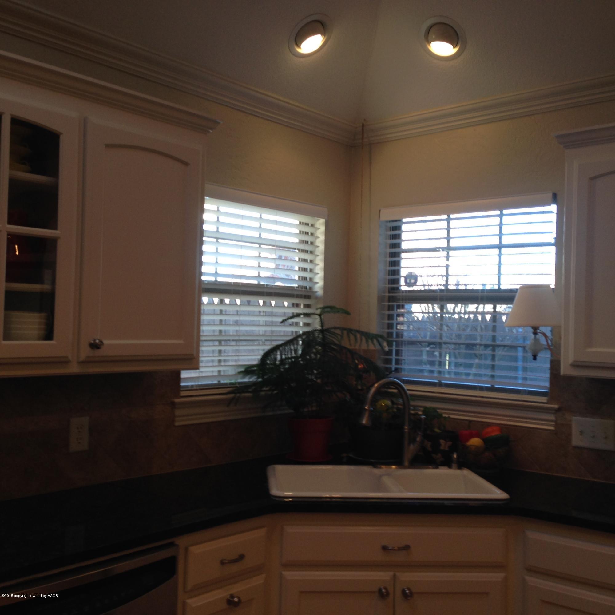 6006 Riley Elizabeth Drive Amarillo, TX 79119 - Photo 22 of 42 kitchen sink to court yard