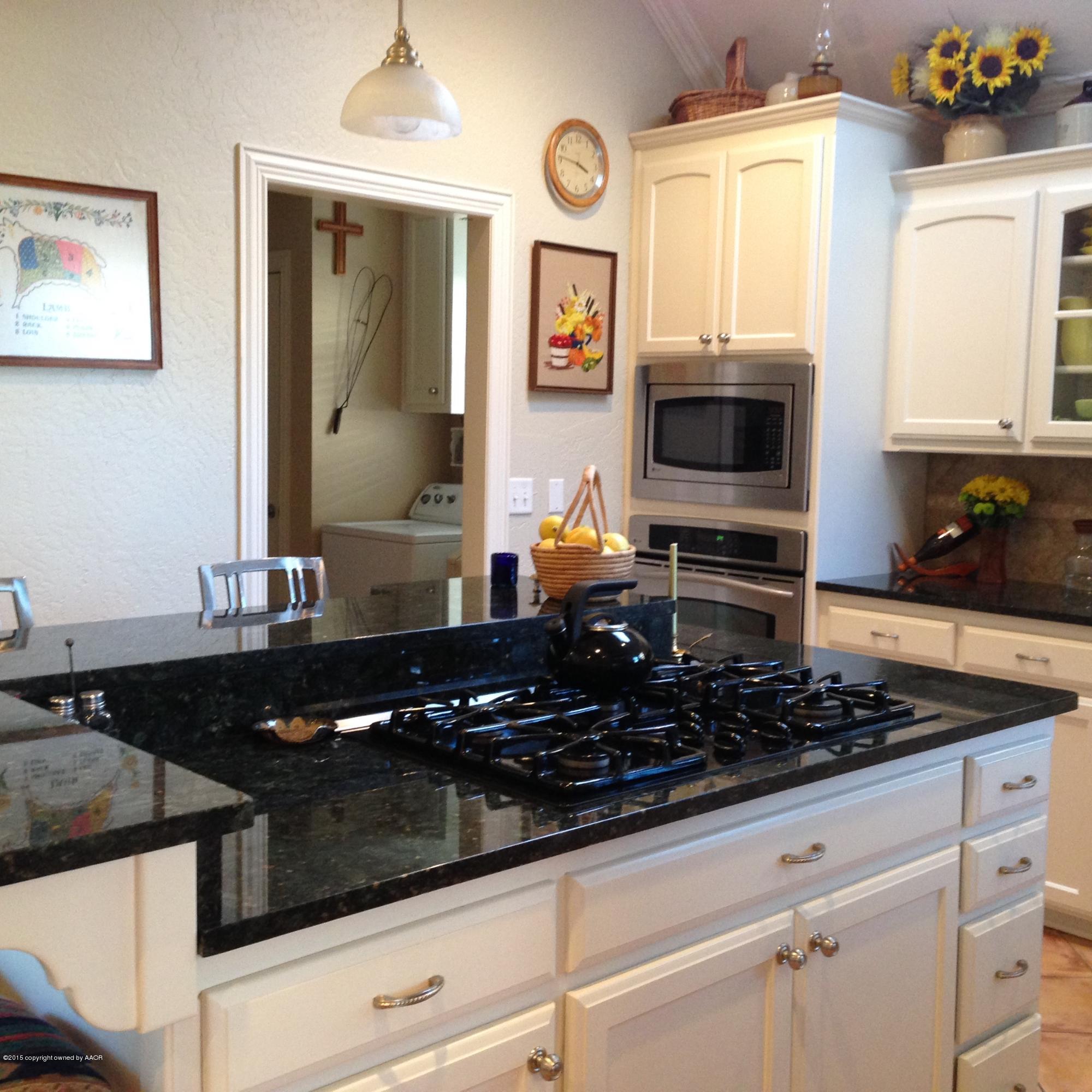 6006 Riley Elizabeth Drive Amarillo, TX 79119 - Photo 23 of 42 kitchen to laundry room