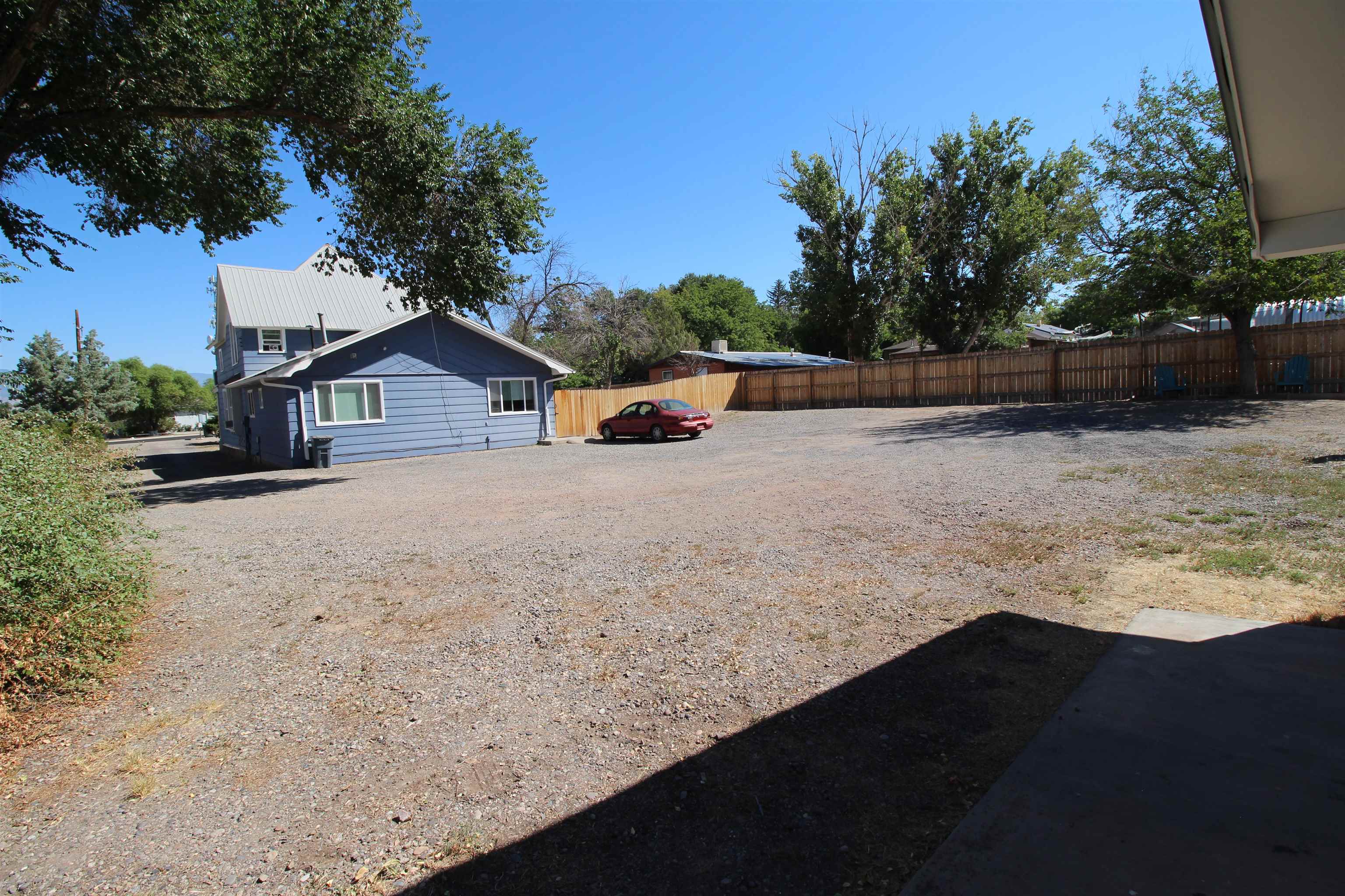 1150 East 7th Street Delta, CO 81416 - Photo 29 of 32 a view of a house with a yard