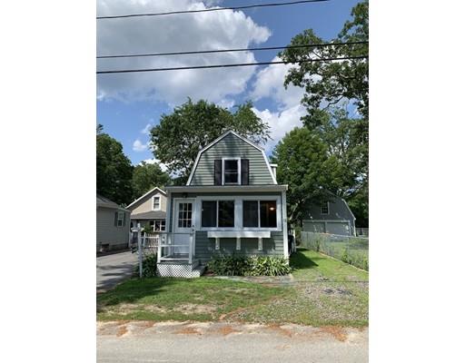 13 Butler Street Wareham, MA 02532 - Photo 1 of 29 a front view of a house with a garden