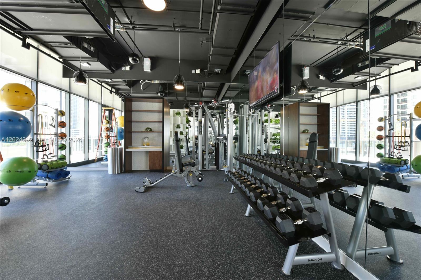 45 Southwest 9th Street, Unit 2109 Miami, FL 33130 - Photo 36 of 40 a view of a room with gym equipment