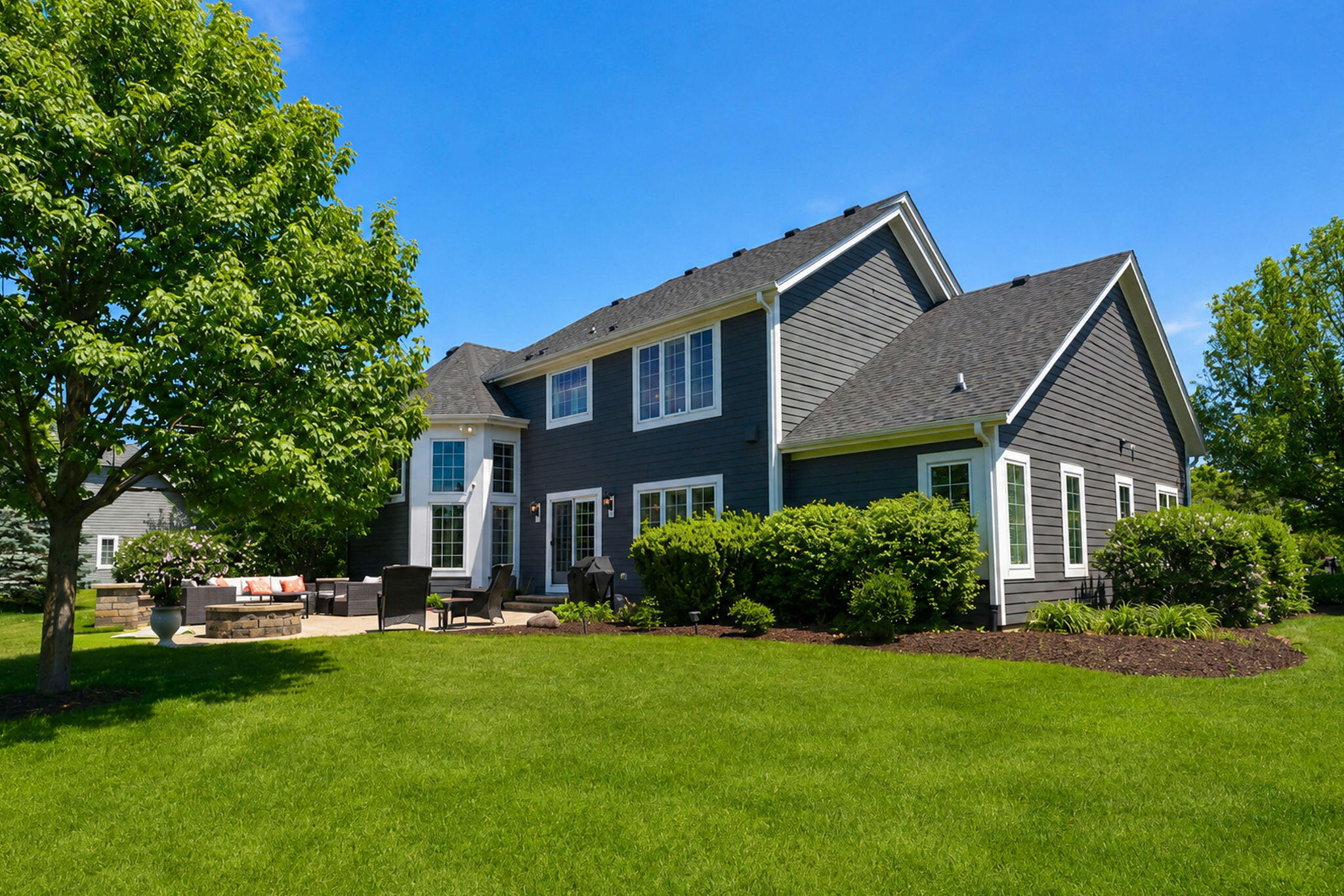 1260 4 Winds Way Hartland, WI 53029 - Photo 5 of 79 Rear Exterior View