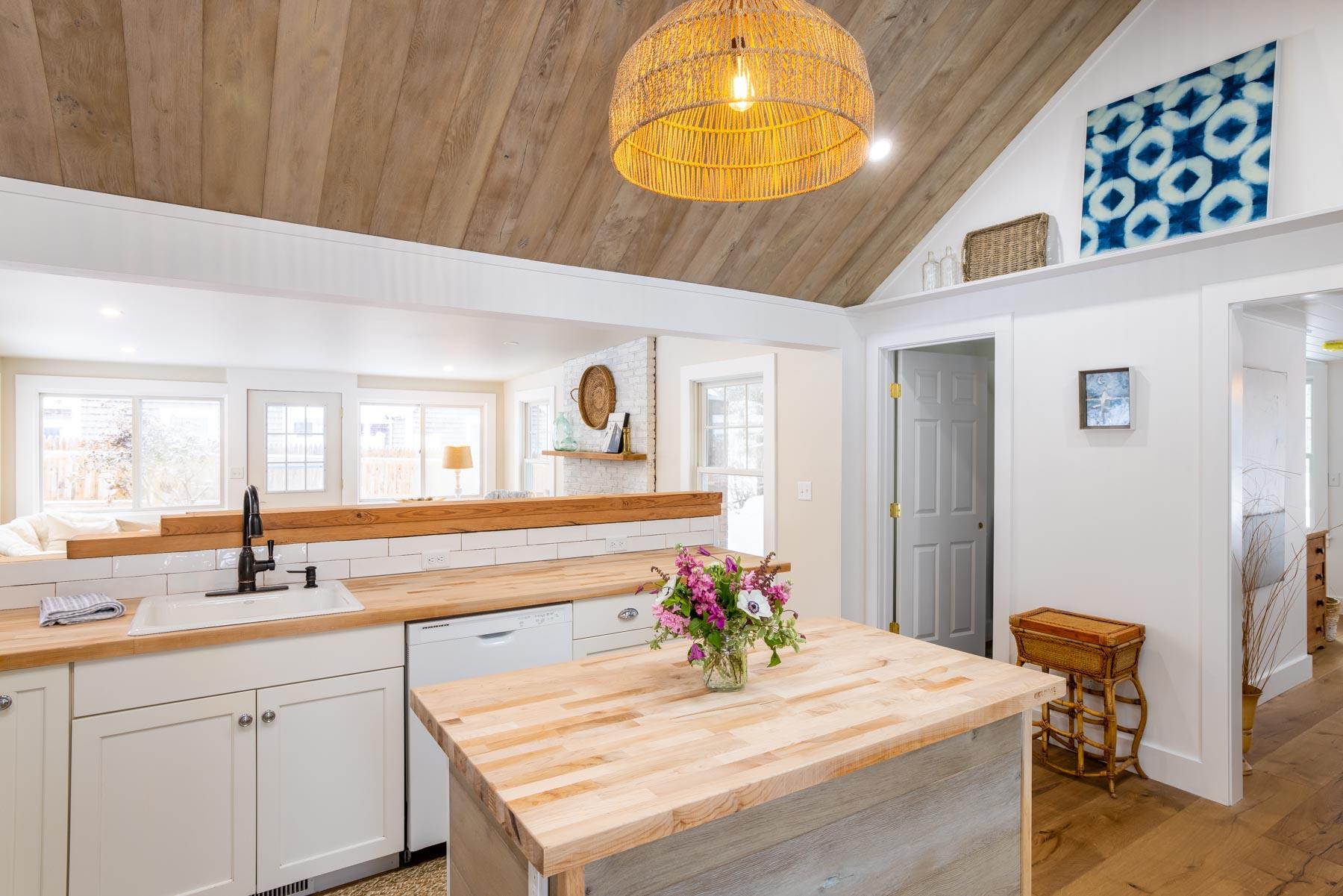 79 Edgartown - West Tisbury Road Edgartown, MA 02539 - Photo 2 of 17 a kitchen with a sink and cabinets