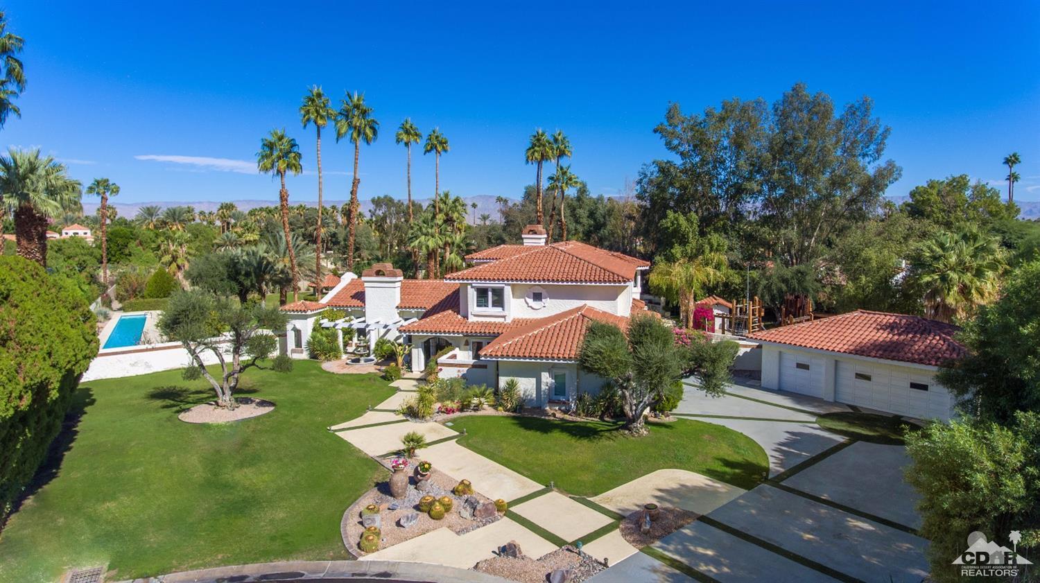 2 Vista Santa Rosa Rancho Mirage, CA 92270 - Photo 2 of 60 a front view of a house with garden