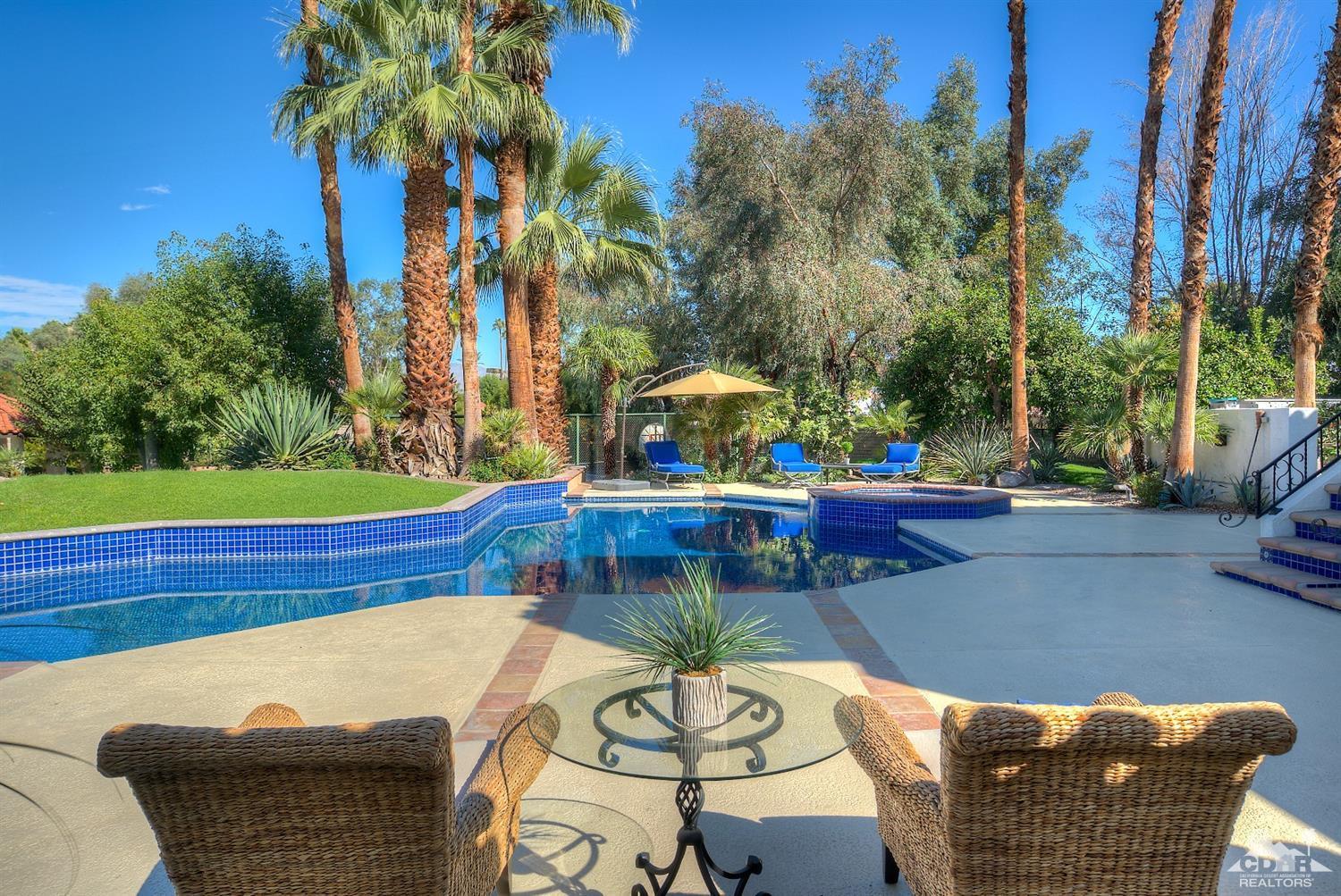 2 Vista Santa Rosa Rancho Mirage, CA 92270 - Photo 11 of 60 a view of a swimming pool with a patio