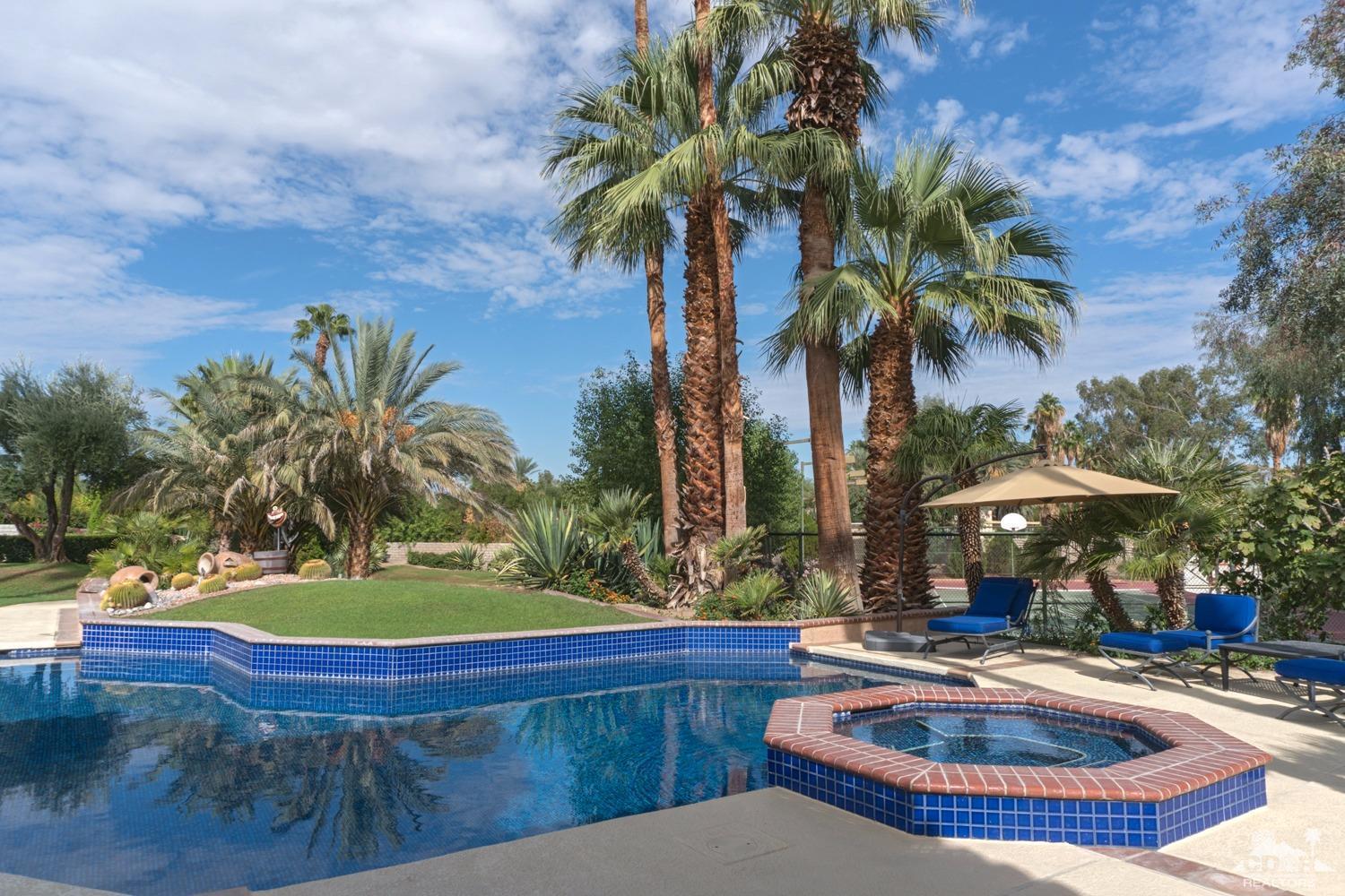 2 Vista Santa Rosa Rancho Mirage, CA 92270 - Photo 19 of 60 a swimming pool with outdoor seating yard and barbeque oven