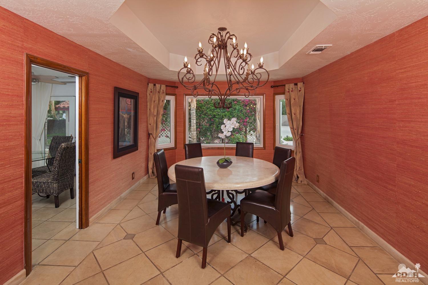 2 Vista Santa Rosa Rancho Mirage, CA 92270 - Photo 32 of 60 a view of a dining room with furniture window and outside view