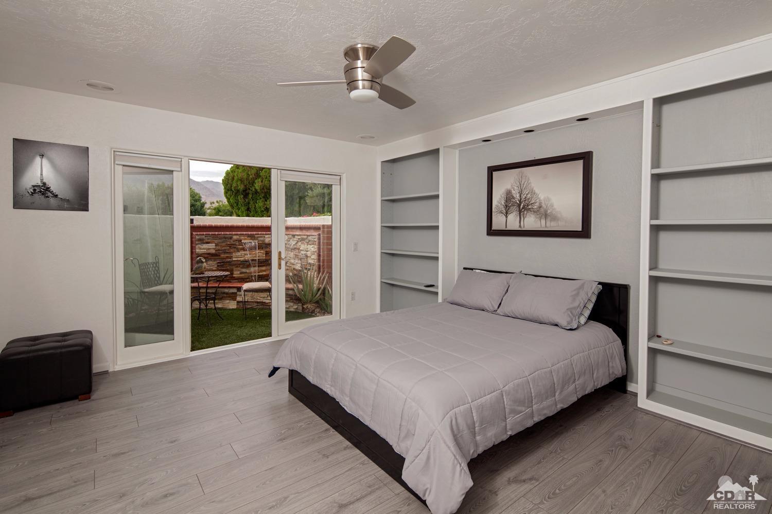 2 Vista Santa Rosa Rancho Mirage, CA 92270 - Photo 37 of 60 a bedroom with a bed and a view of closet