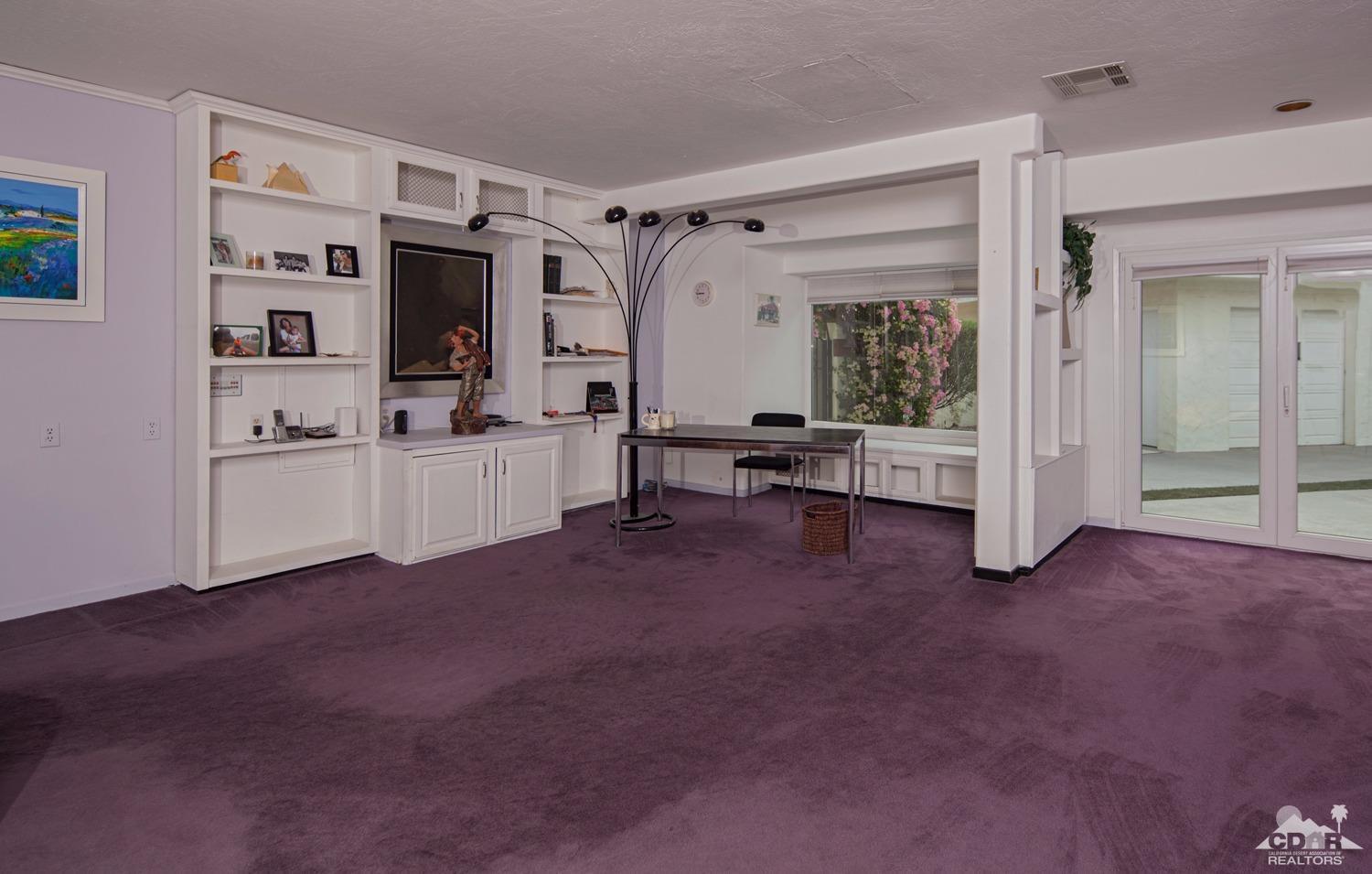 2 Vista Santa Rosa Rancho Mirage, CA 92270 - Photo 43 of 60 a view of a big room with windows and cabinet