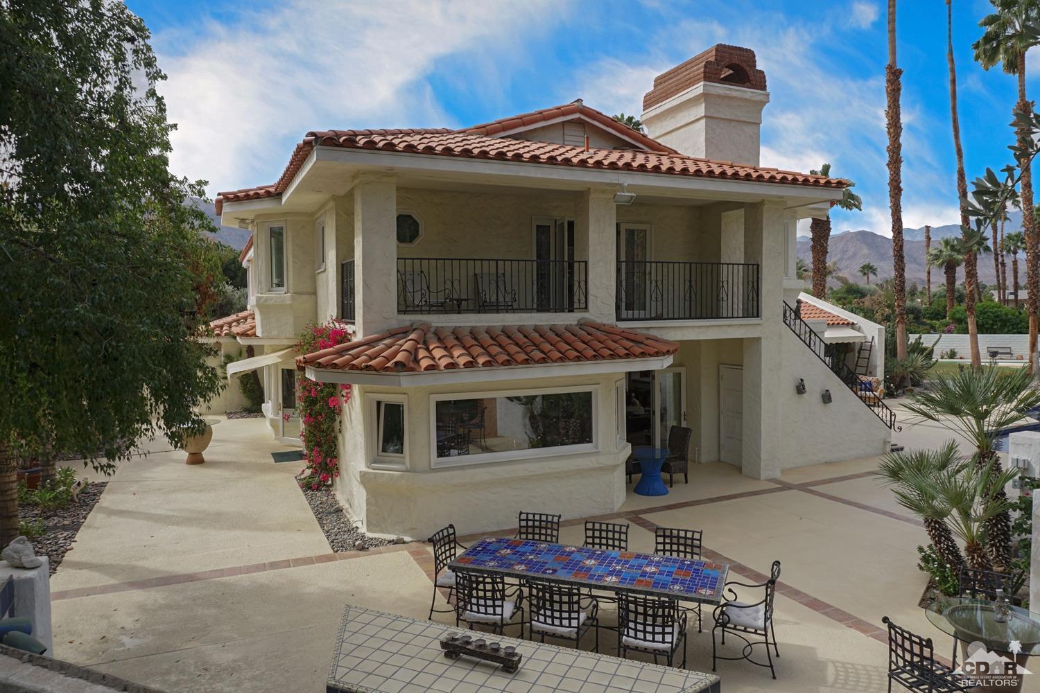 2 Vista Santa Rosa Rancho Mirage, CA 92270 - Photo 46 of 60 a front view of a house with a porch