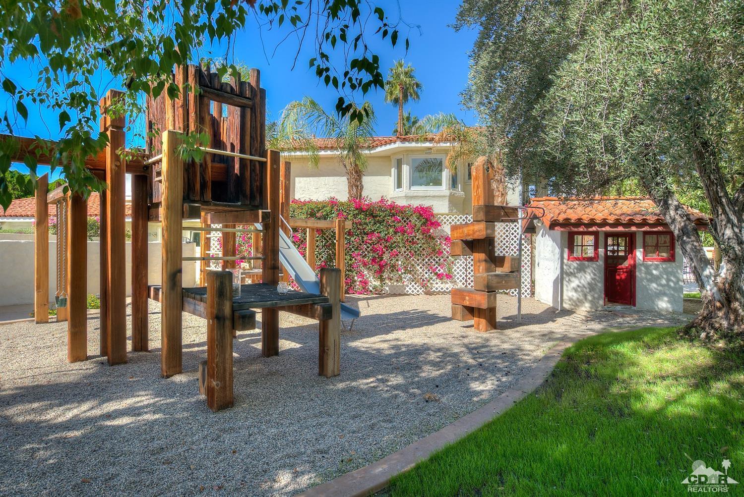 2 Vista Santa Rosa Rancho Mirage, CA 92270 - Photo 50 of 60 a view of a house with a porch and sitting area