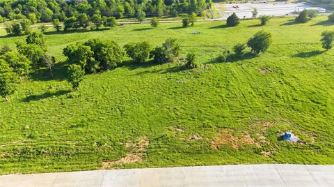 a view of a garden with an outdoor space