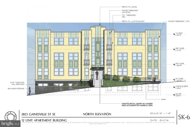 a black and white photo of a living room