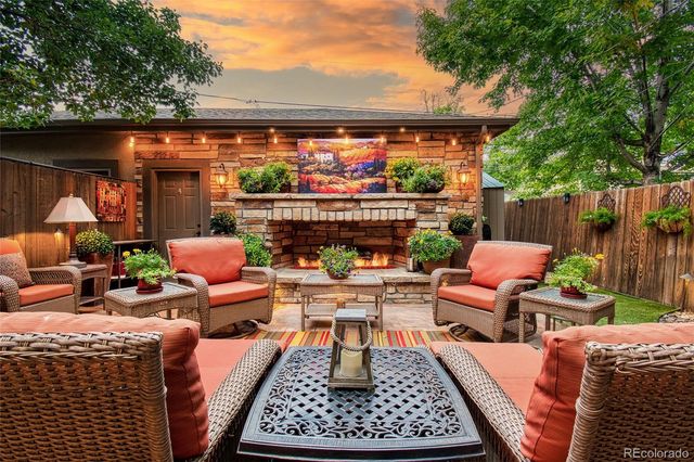 a outdoor living space with patio furniture and a potted plant