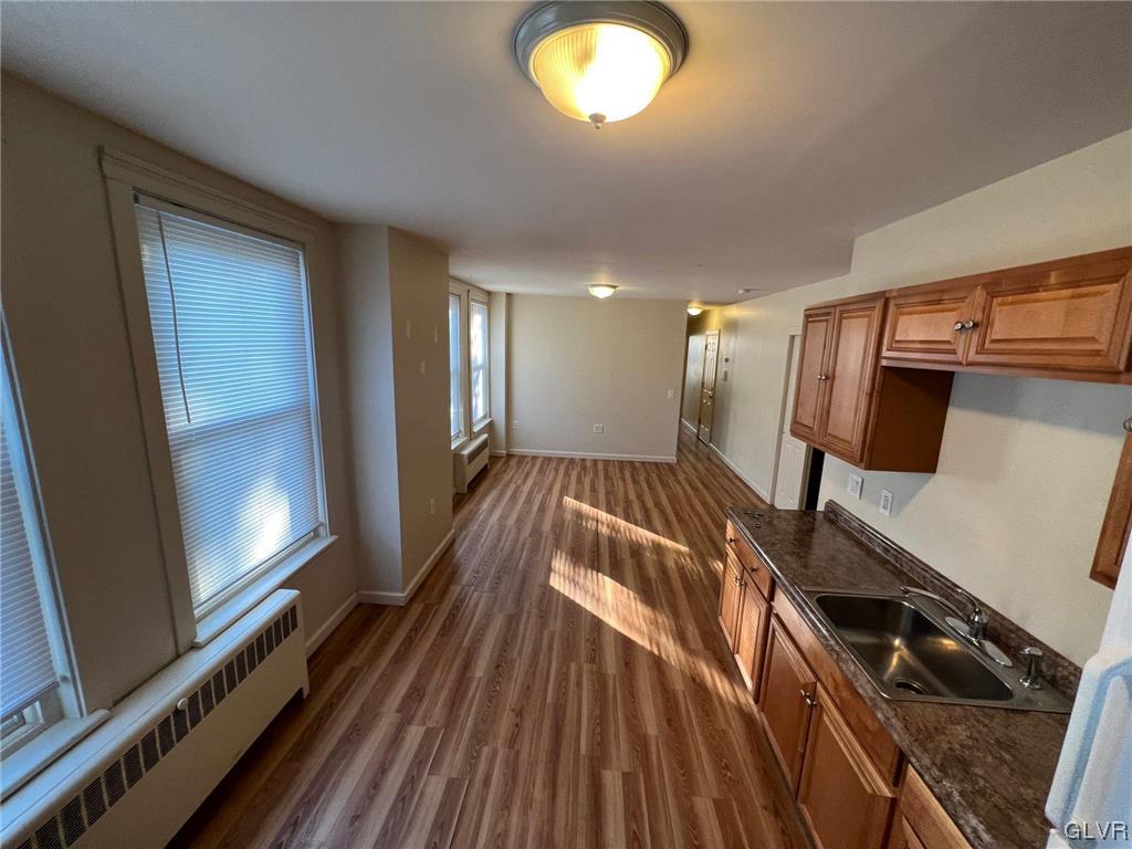 739 East 7th Street, Unit 2 Bethlehem, PA 18015 - Photo 4 of 11 a view of a room with wooden floor