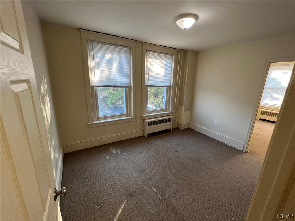 739 East 7th Street, Unit 2 Bethlehem, PA 18015 - Photo 9 of 11 an empty room with windows and closet
