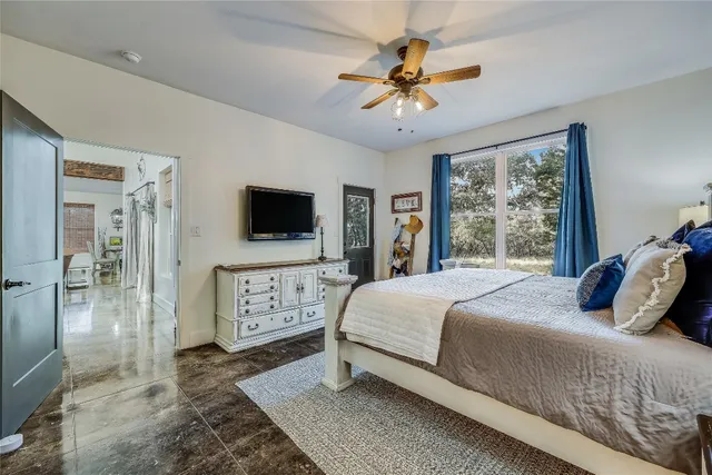 a bathroom with a double vanity sink mirror and shower