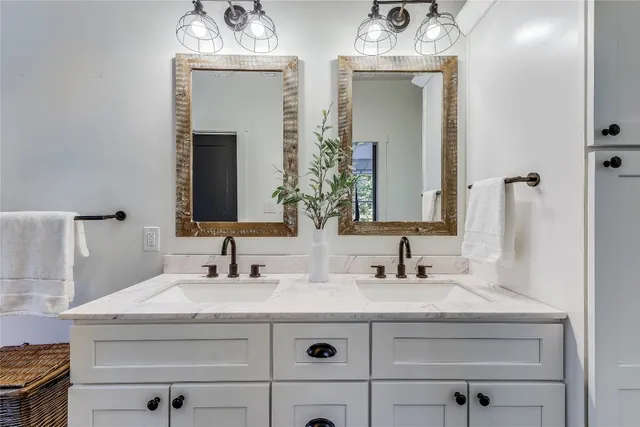 a living room with patio furniture and garden
