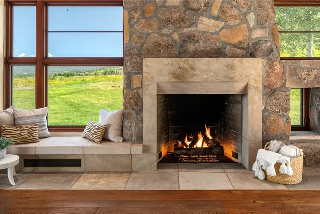a view of backyard with a garden and outdoor seating