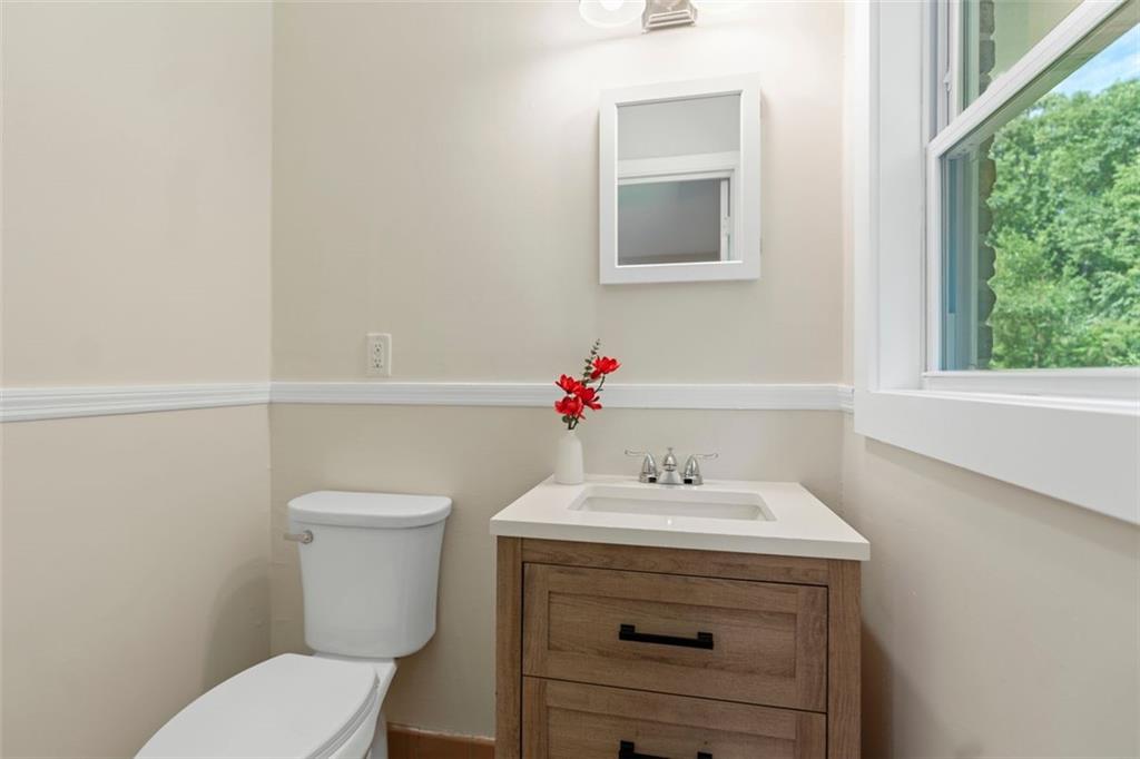 2483 Hunting Valley Drive Decatur, GA 30033 - Photo 12 of 24 a bathroom with a sink mirror and toilet
