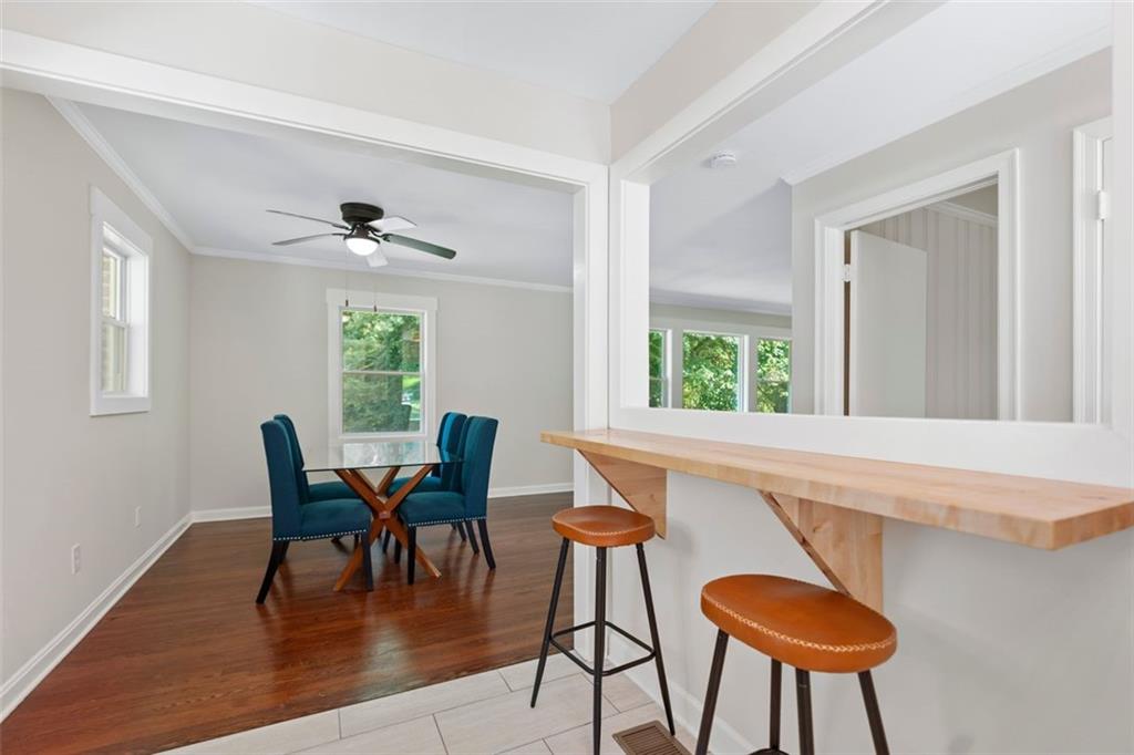 2483 Hunting Valley Drive Decatur, GA 30033 - Photo 4 of 24 a view of a dining room with furniture and a window