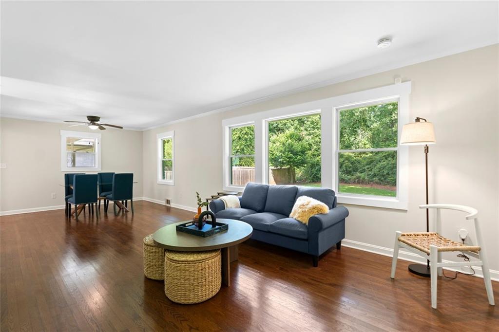 2483 Hunting Valley Drive Decatur, GA 30033 - Photo 9 of 24 a living room with furniture and a large window