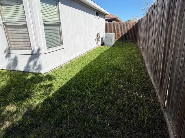 a view of a backyard with plants