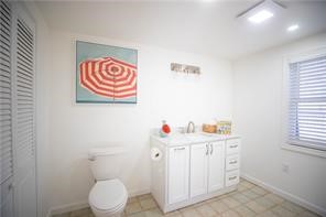 28 Crest Street Middletown, RI 02842 - Photo 11 of 17 Full bath with laundry area