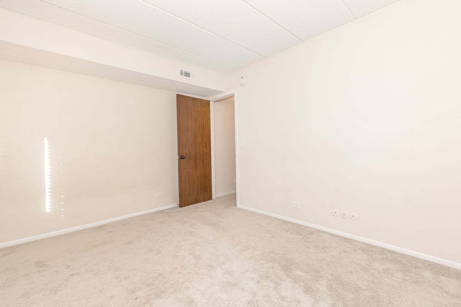 486 Timber Ridge Drive, Unit 102 Carol Stream, IL 60188 - Photo 12 of 23 a view of an empty room