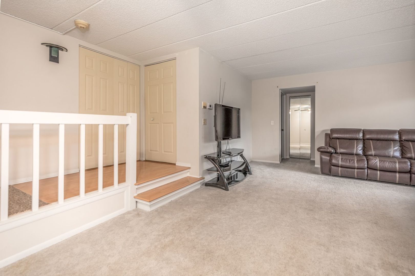 486 Timber Ridge Drive, Unit 102 Carol Stream, IL 60188 - Photo 6 of 23 a view of a livingroom with furniture and a window