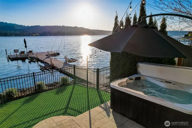 a view of a terrace with couches and city view