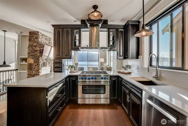 a kitchen with a stove and a sink