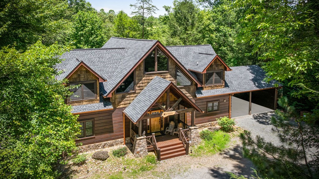 1082 Sunset Road Epworth, GA 30541 - Photo 2 of 69 an aerial view of a house with a garden