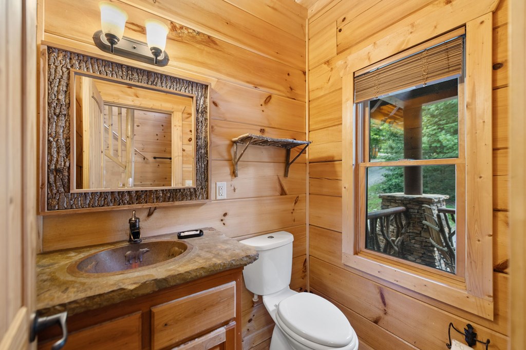 1082 Sunset Road Epworth, GA 30541 - Photo 31 of 69 a bathroom with a sink a toilet and shower