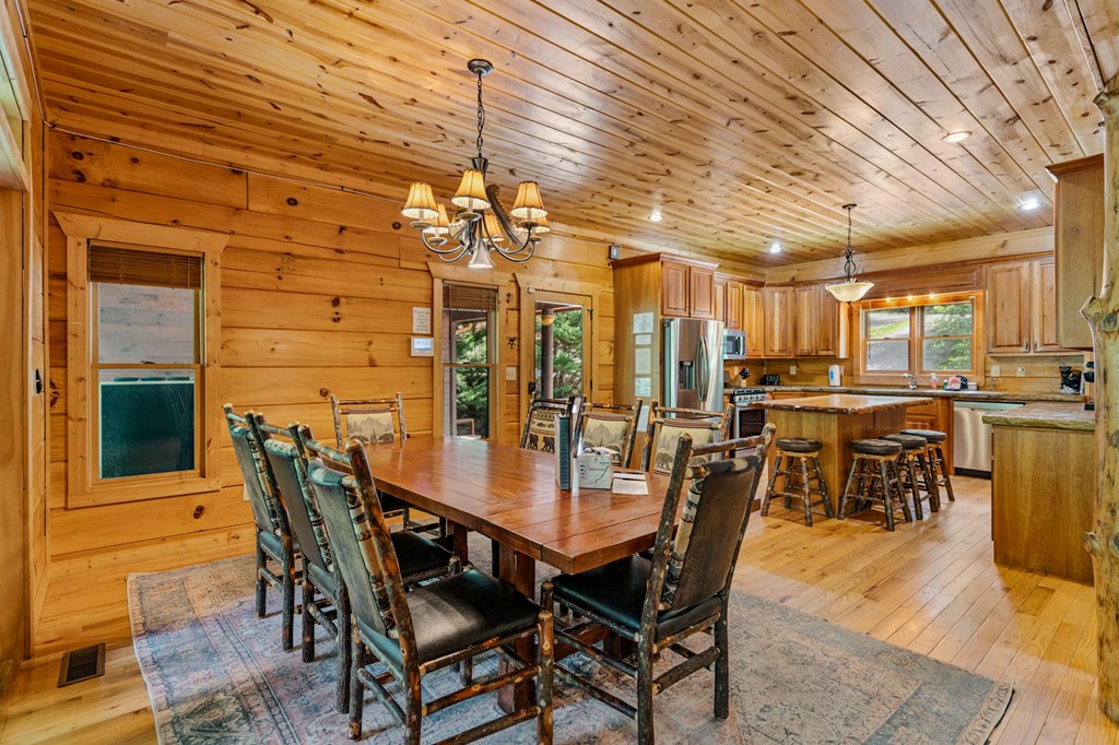 1082 Sunset Road Epworth, GA 30541 - Photo 39 of 69 a dining room with furniture and window