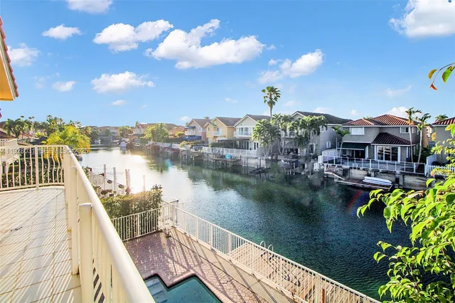 a view of a lake with a city from a terrace