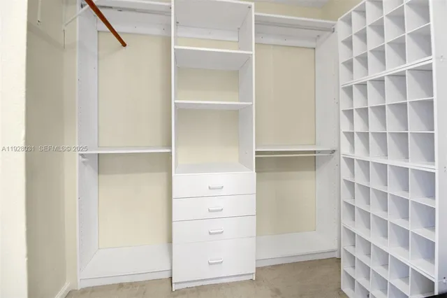 a view of an empty walk in closet