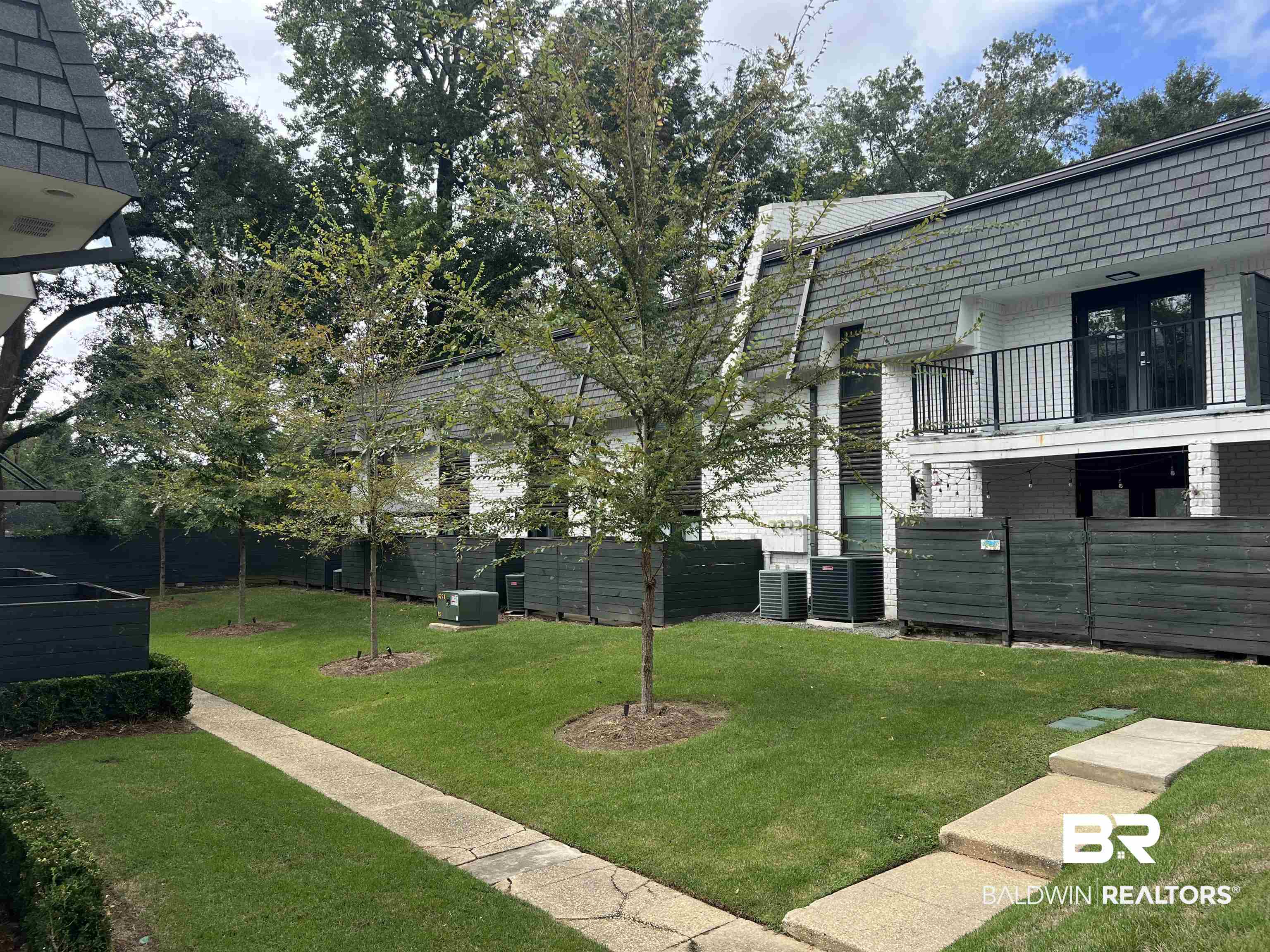3655 Old Shell Road, Unit 219 Mobile, AL 36608 - Photo 24 of 25 View of yard with a balcony