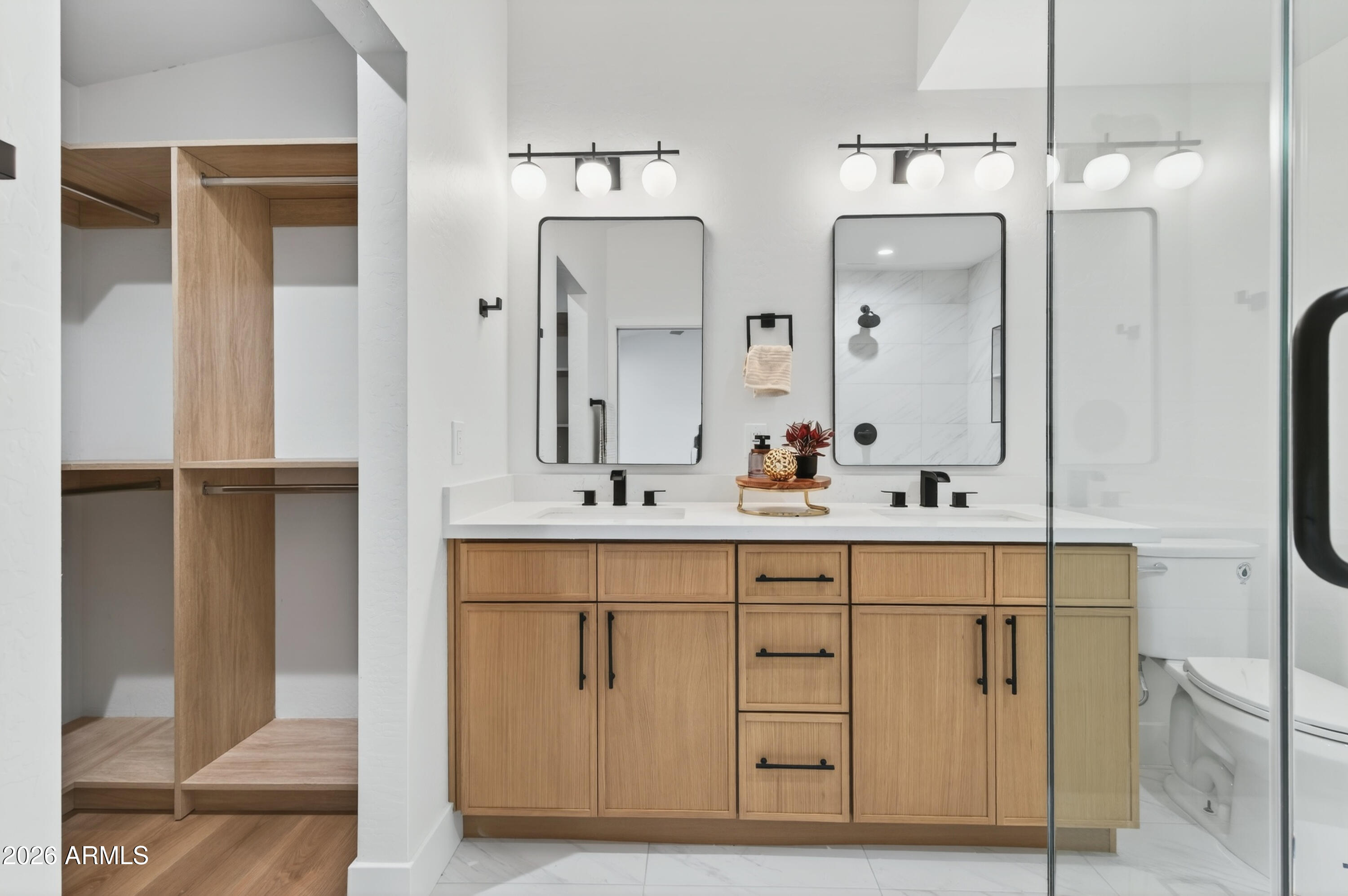 2432 West St Moritz Lane Phoenix, AZ 85023 - Photo 31 of 41 Primary Bathroom with Entry to Closet