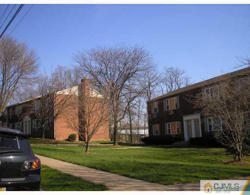 50 Fox Road, Unit 3B Edison, NJ 08817 - Photo 8 of 8 a view of a house with a yard
