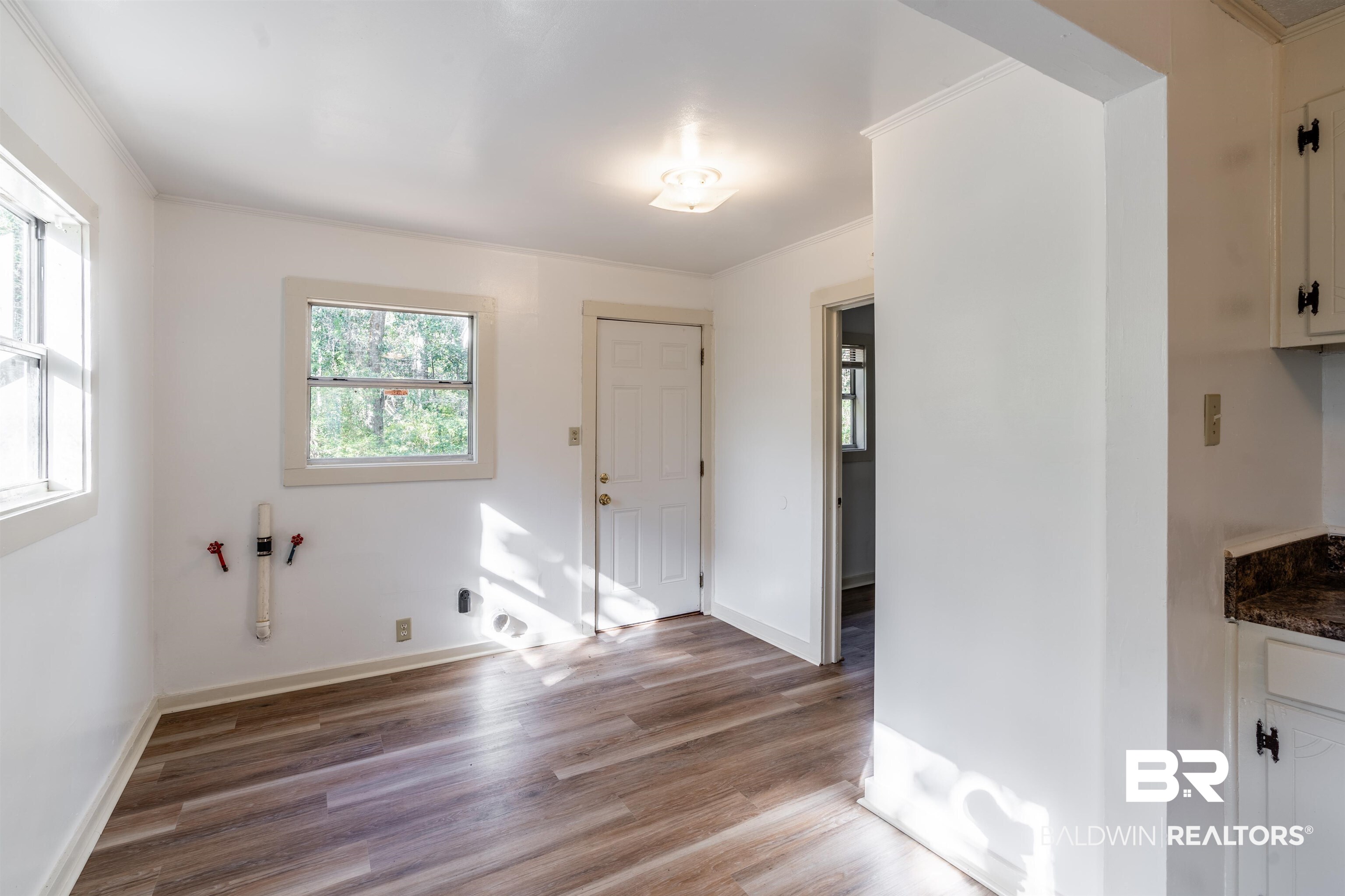 3900 Brookmont Drive Mobile, AL 36605 - Photo 7 of 19 Interior space featuring ornamental molding and wood-type flooring