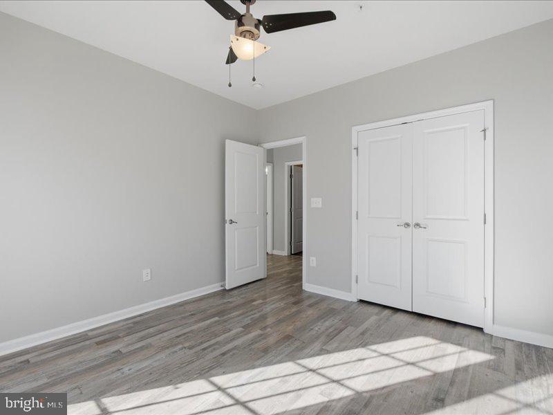 42143 Piebald Square Aldie, VA 20105 - Photo 16 of 34 wooden floor in an empty room
